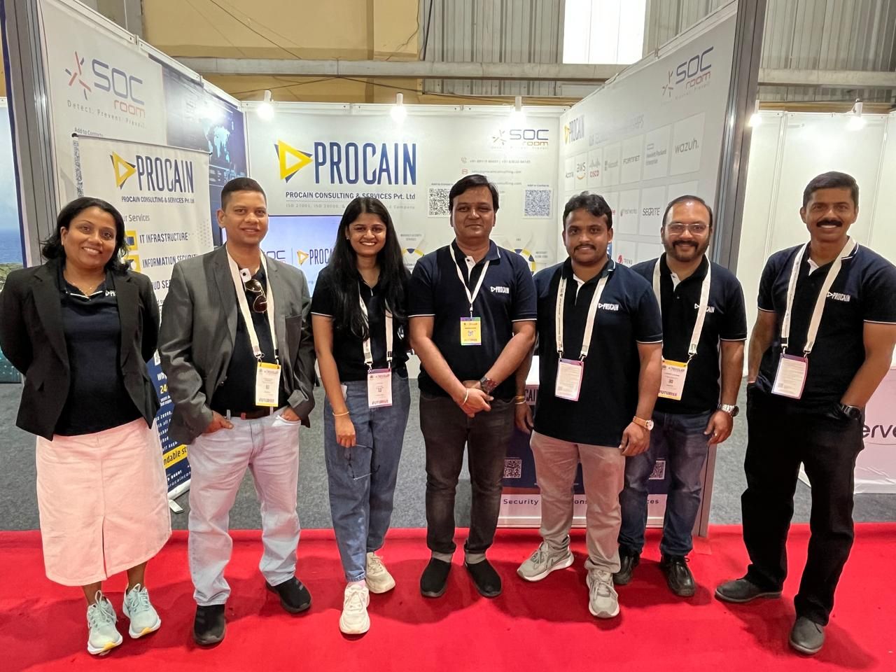 SOCroom team at the Procain booth during an industry event